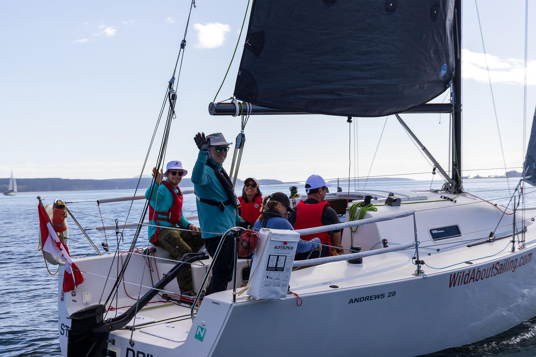 Our Andrews 28, Student Driver A happy group sailing aboard Student Driver.